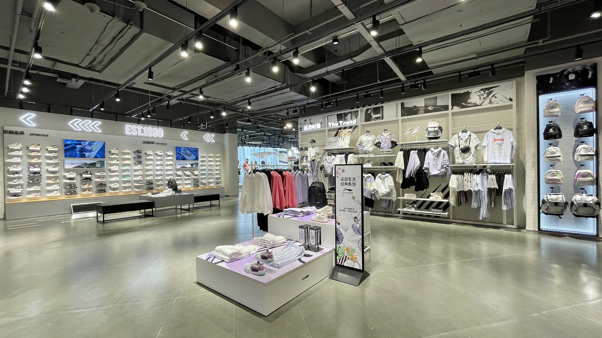 Shoe displays, garment bays and display islands in a completed retail space